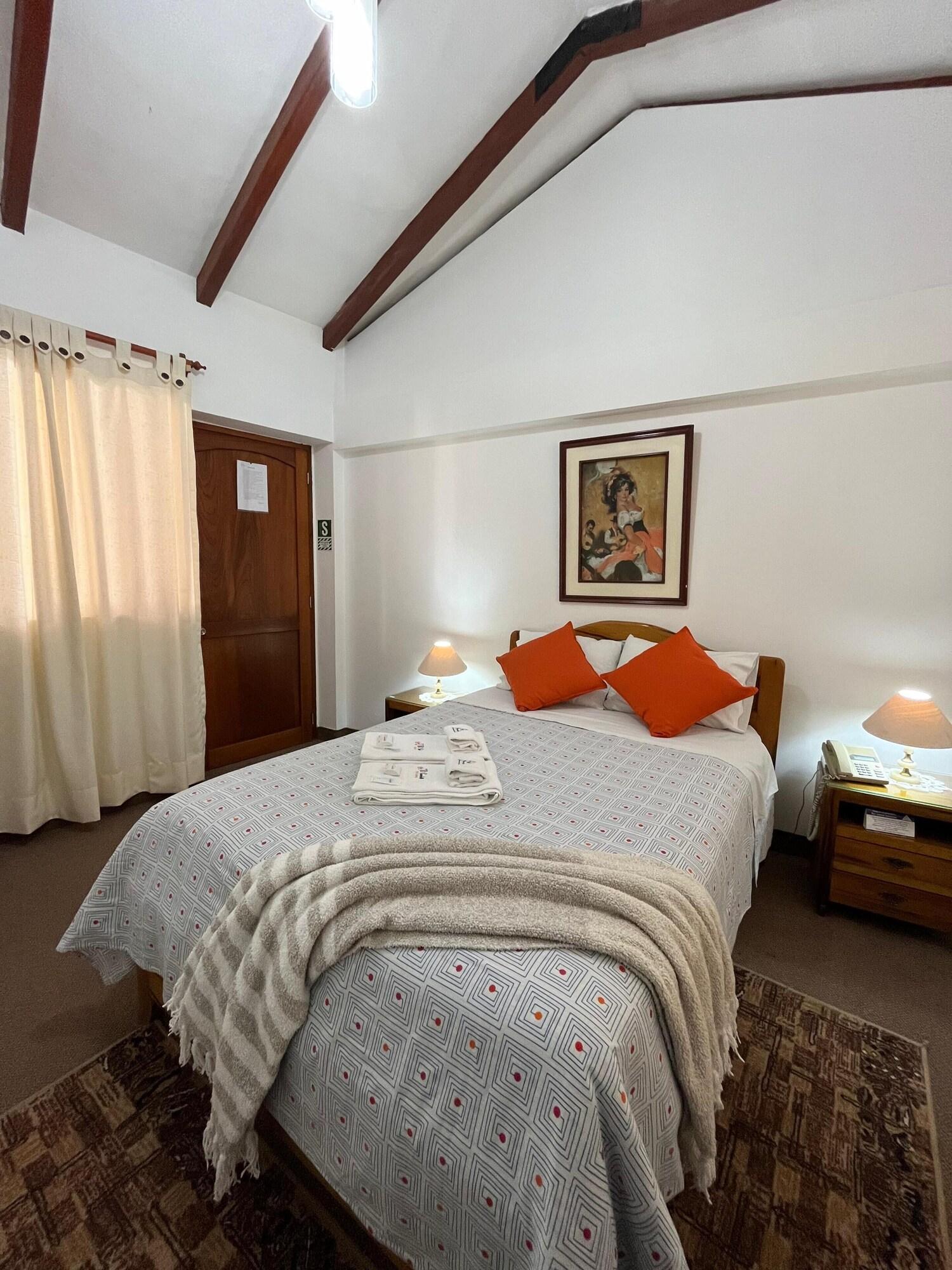 Habitación EL CUMBE INN