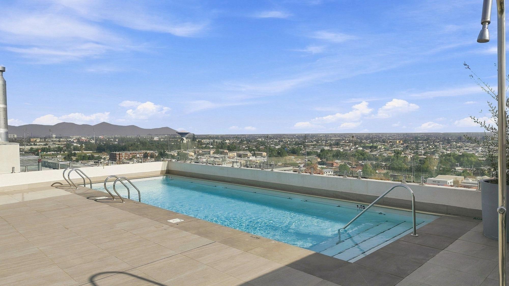 Vista Piscina Oceana Suites Briones Luco La Cisterna