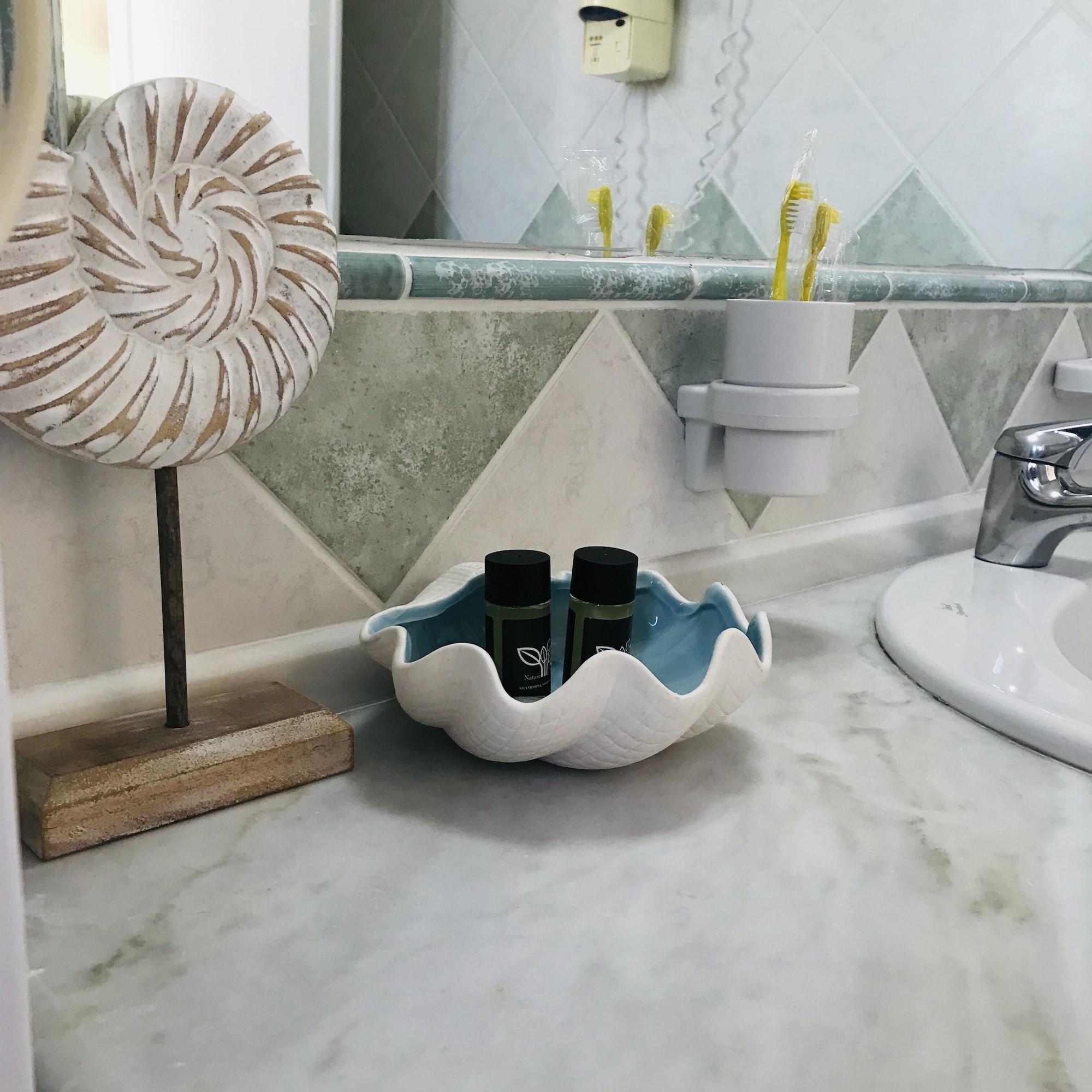 Equipamiento de Habitación L'Eremo Luxury Apartments