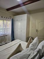 Alquiler Vacacional - 2-bedroom cozy apartment in a prime location in Lusaka with AC, fitness room