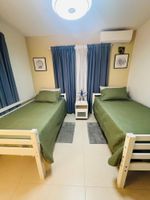 Alquiler Vacacional - Pet friendly Cozy Apartment,  Private backyard & balcony pool first floor gated
