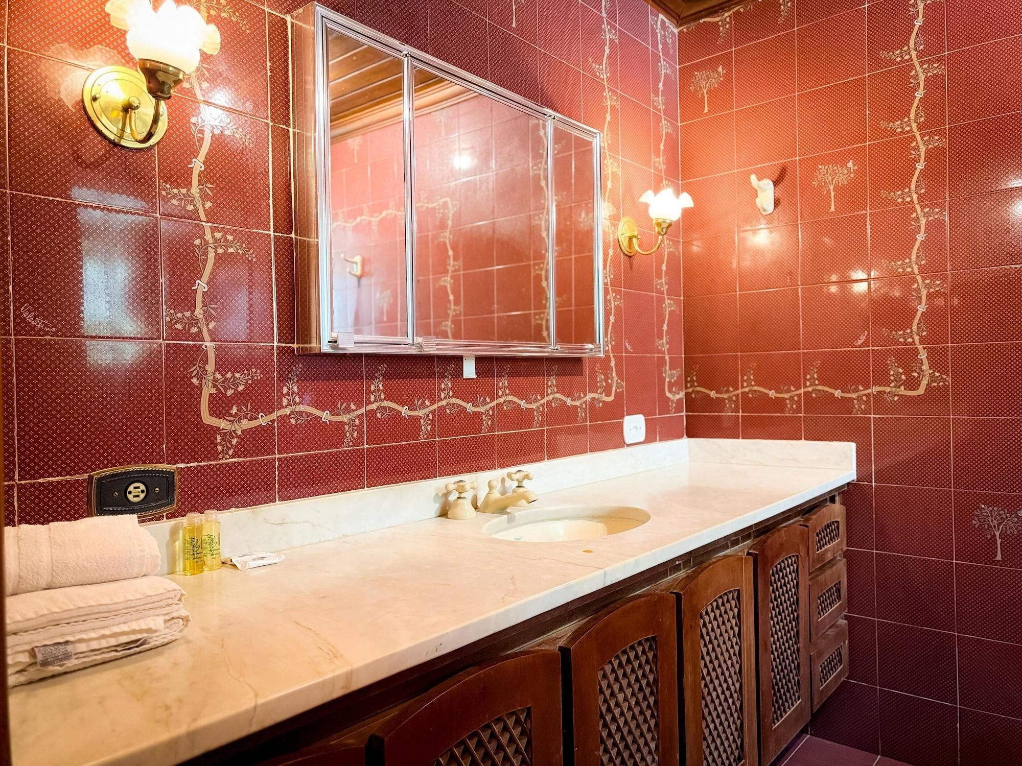 Comodidades do quarto Pousada La Bella Campos do Jordão