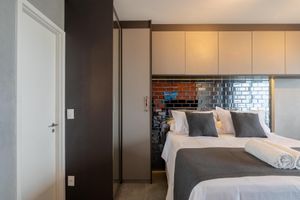 Alquiler Vacacional - Modern studio apartment with queen-size bed in Cityplex Osasco.