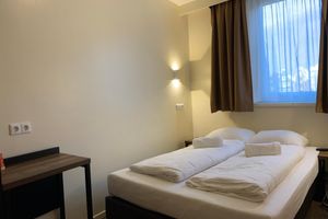 Alojamiento - Budget Dam Hotel
