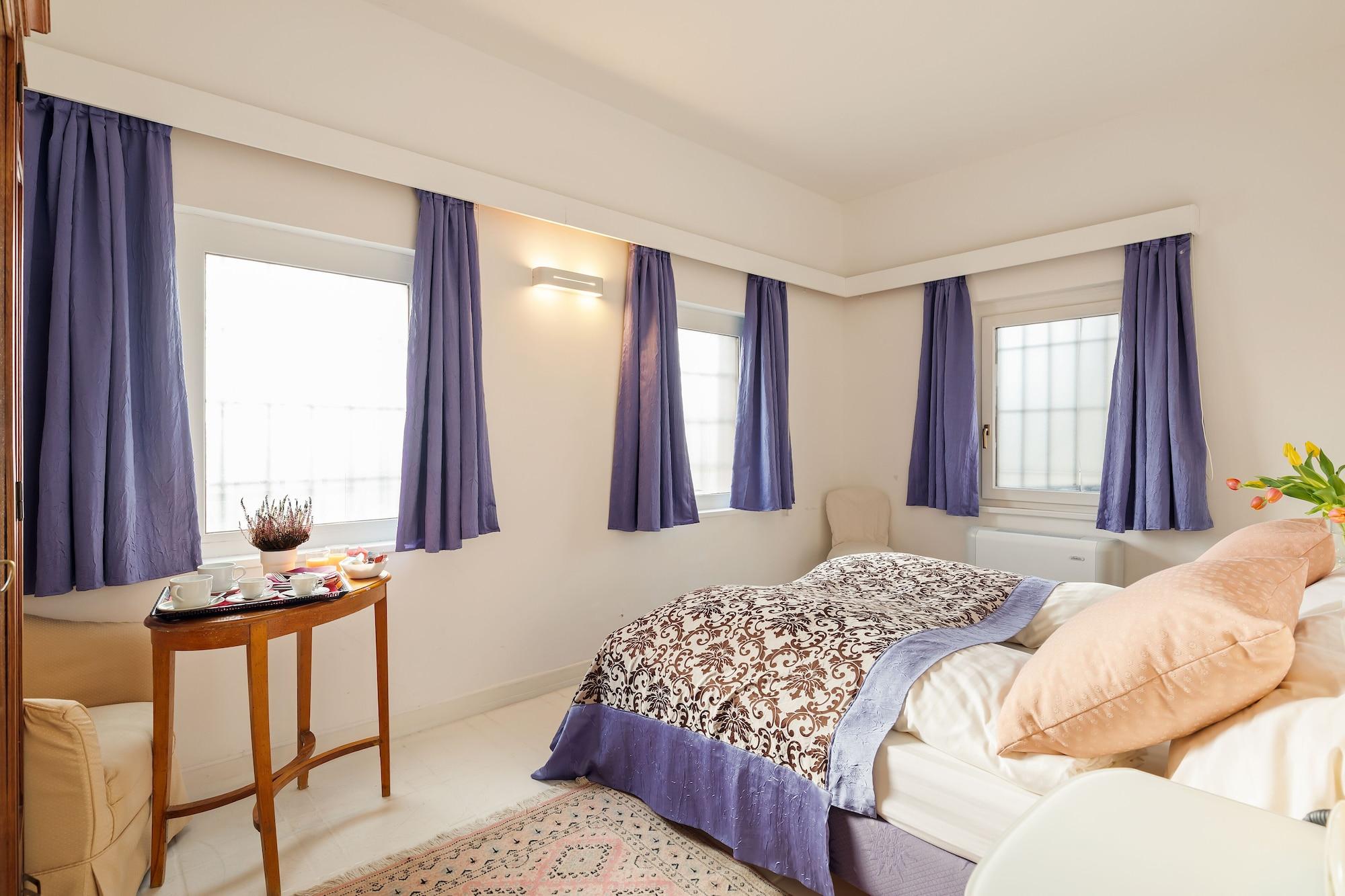 Habitación Villa Pambuffetti
