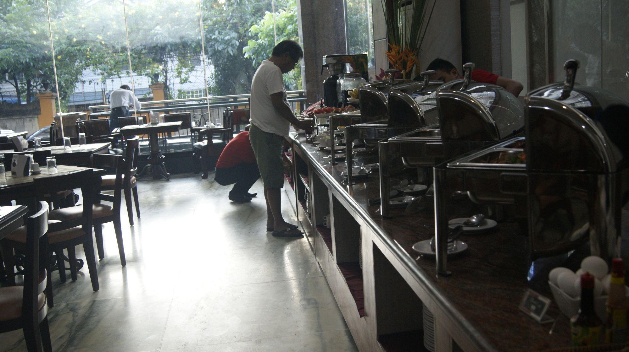 Restaurant MJ Hotel & Suites