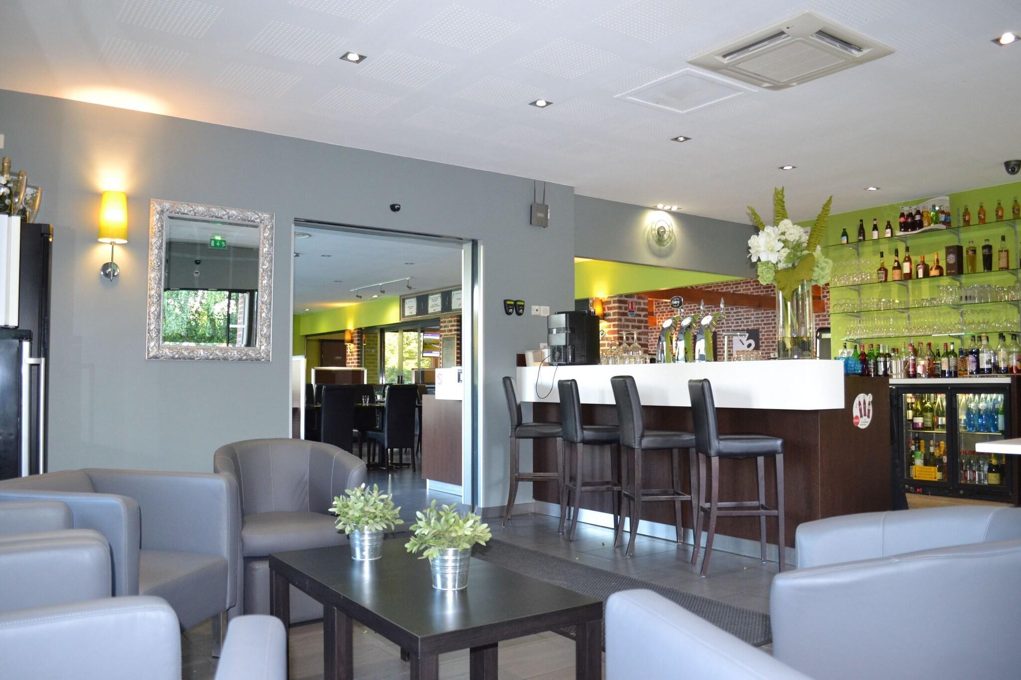 Bar/Salón Le Domaine des Cigognes