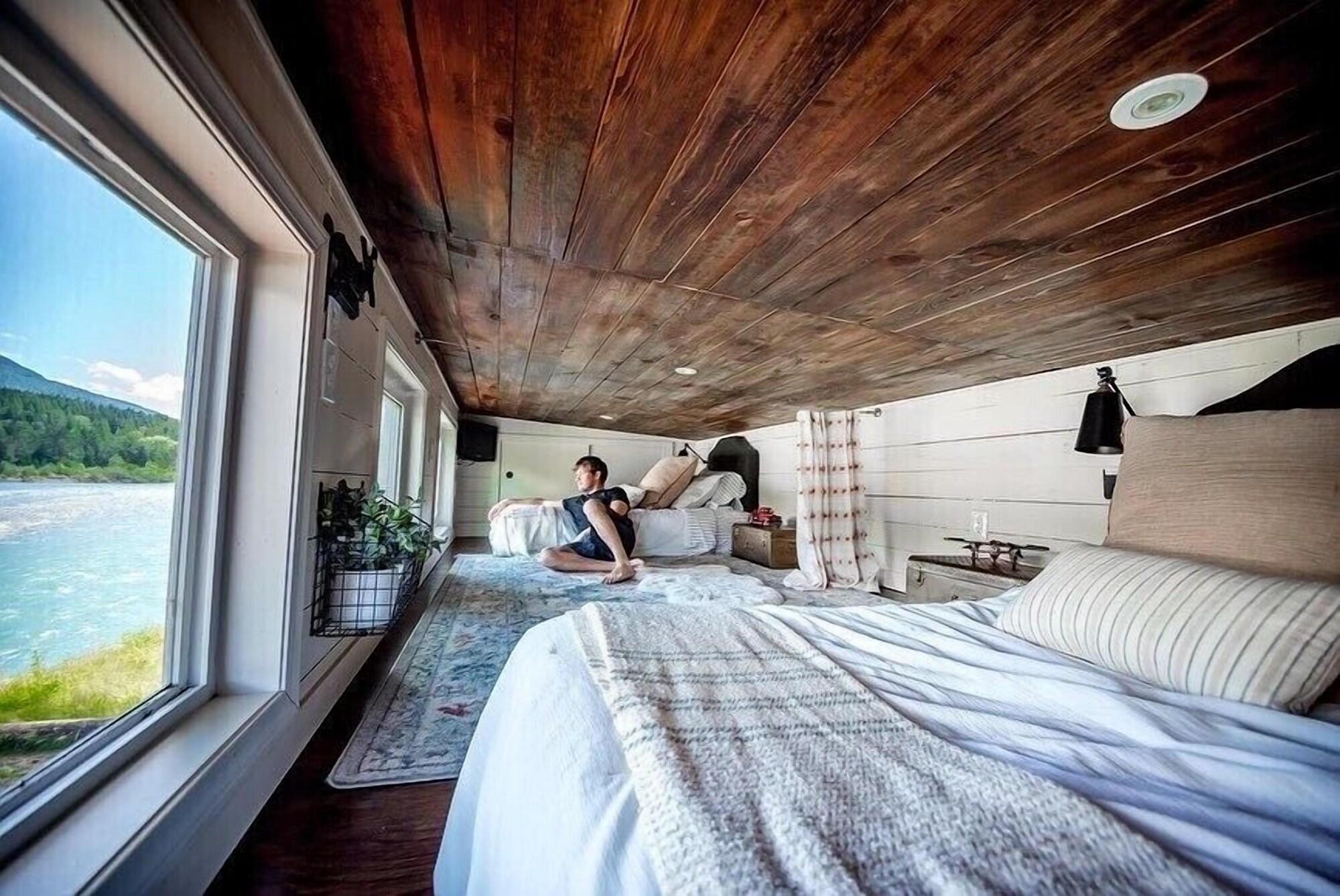 a riverfront retreat nestles on the Cowlitz River Packwood Houses for