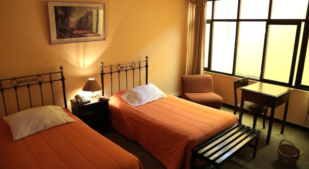 Habitación Maison Plaza