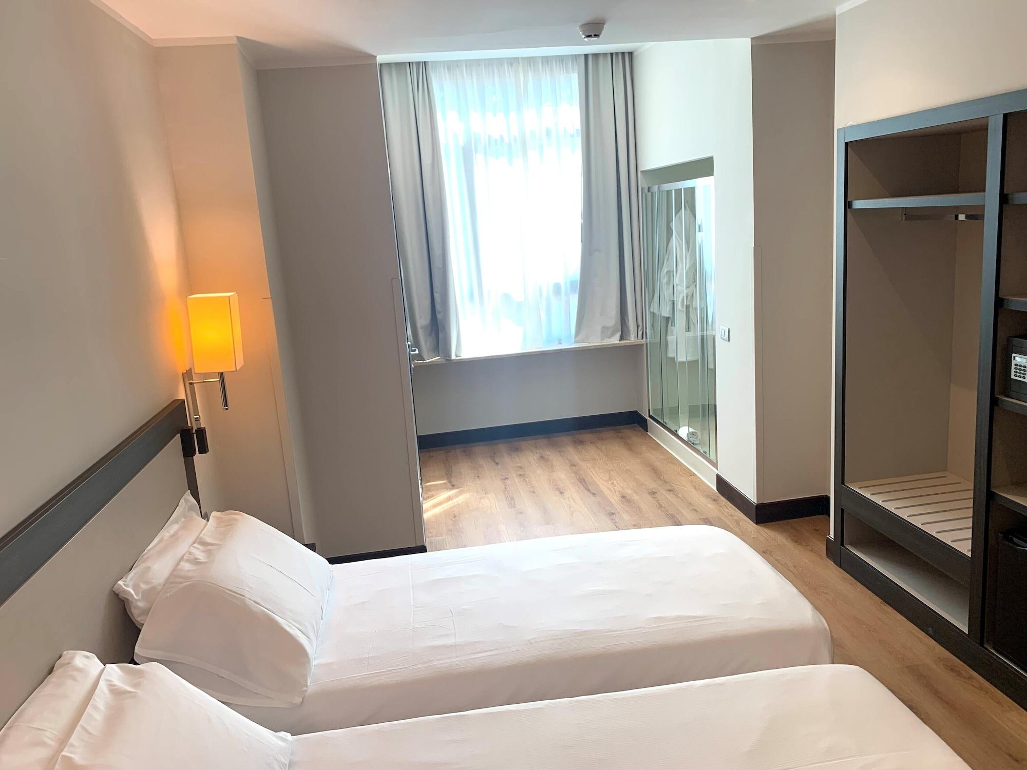 Habitación Hotel Leonardo Da Vinci