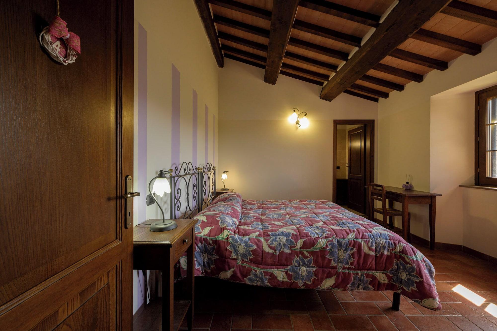 Habitación agriturismo Castel d'Alfiolo-Barcomonte