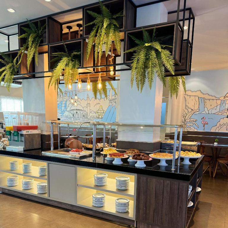 Área de desayuno HOTEL PORTINARI PONTE