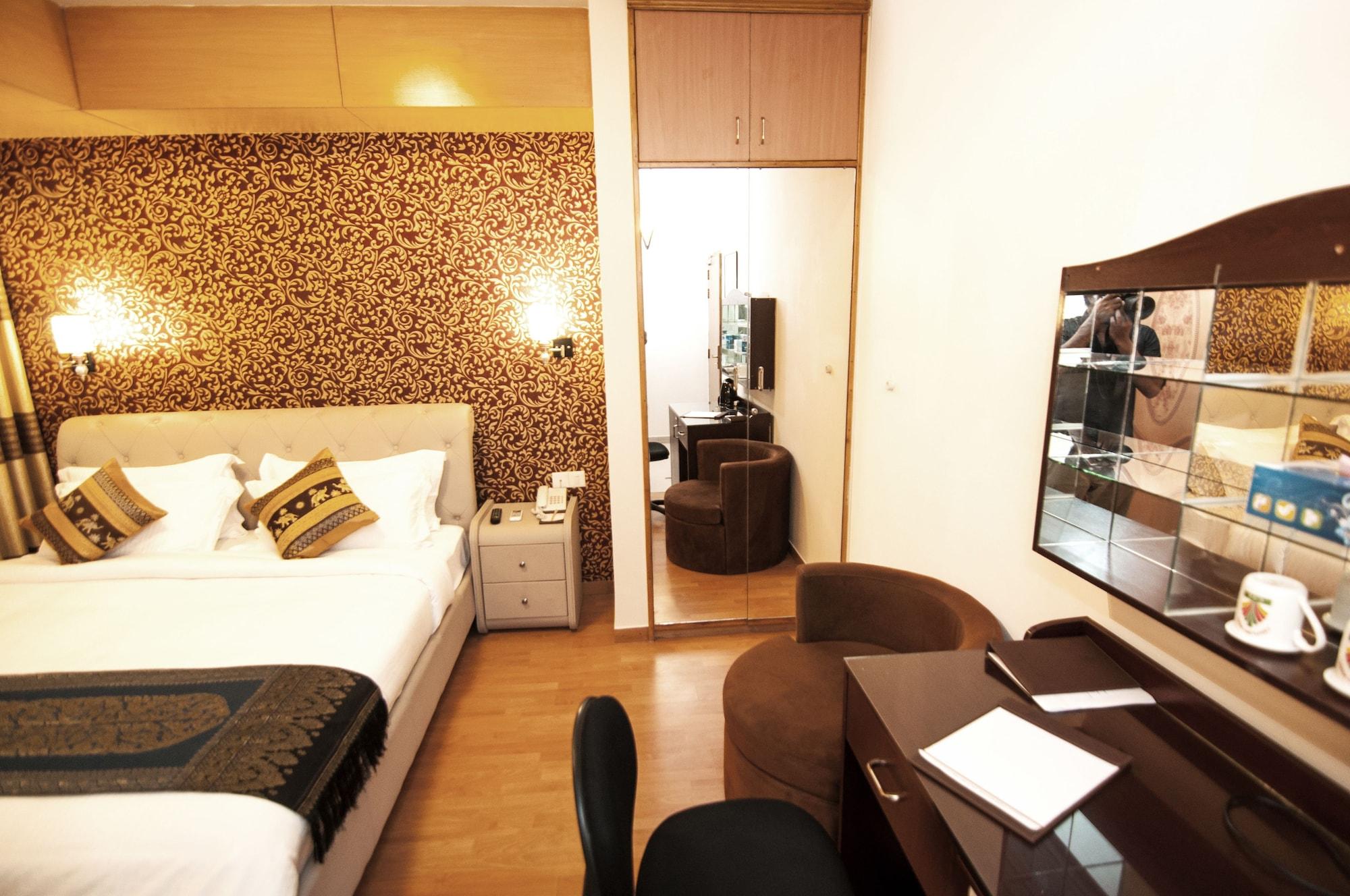 Habitación Century Park Residence