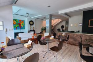 Alojamiento - Habitat Suites Hotel
