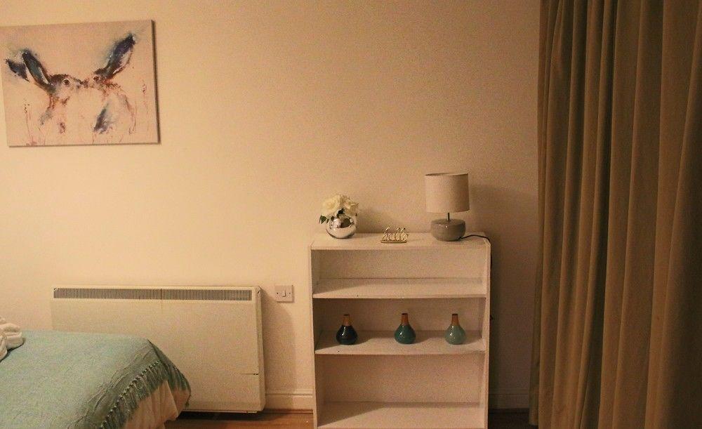 Habitación City NQ Apartments