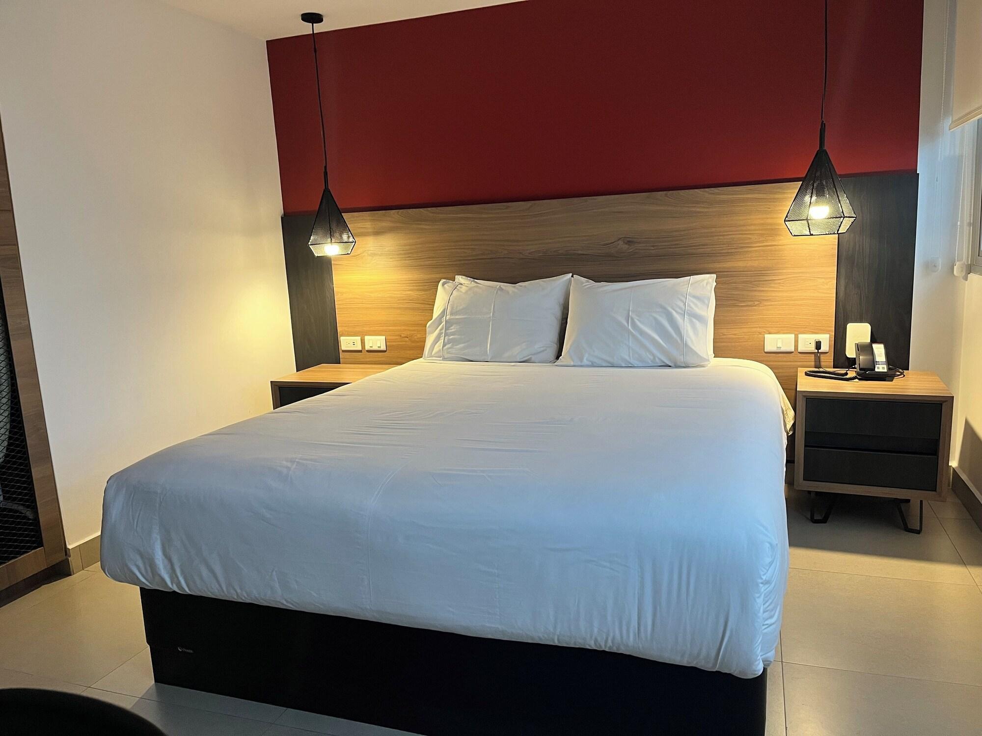 Quarto The Place Hotel