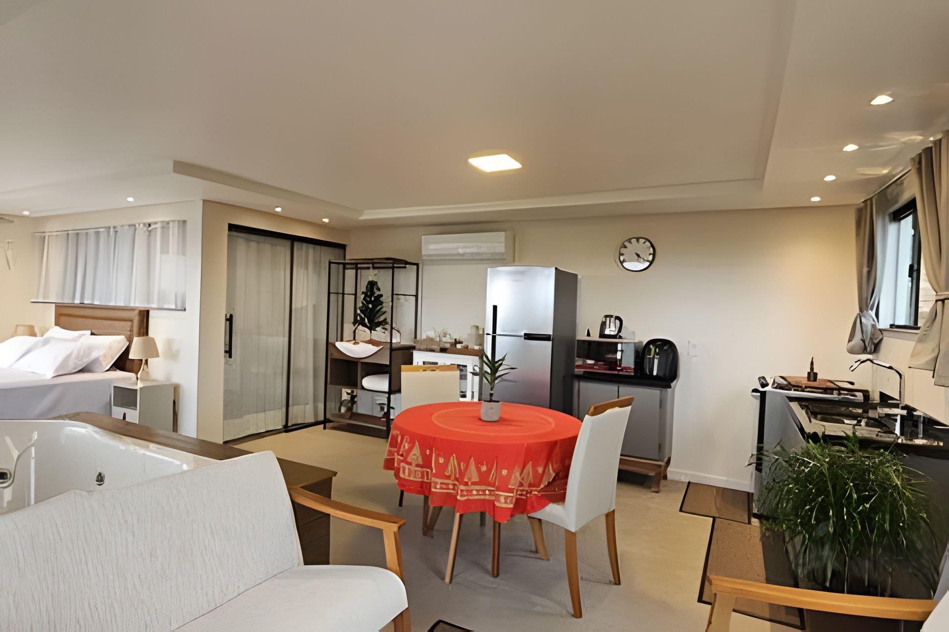 Comodidades del Alojamiento Recanto Pôr do Sol com banheira e lareira