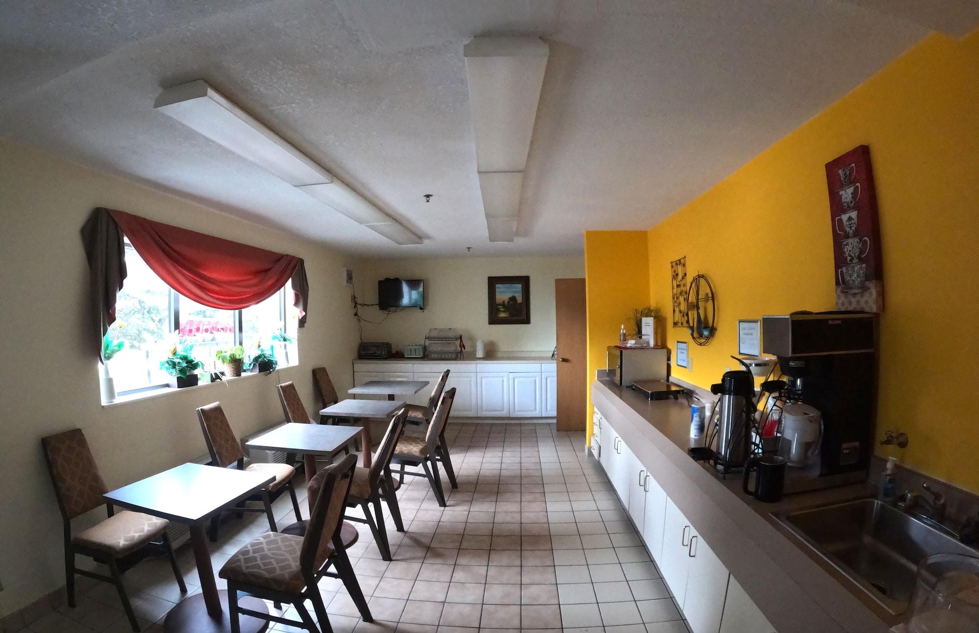 Restaurant Pleasant Stay Inn & Suites