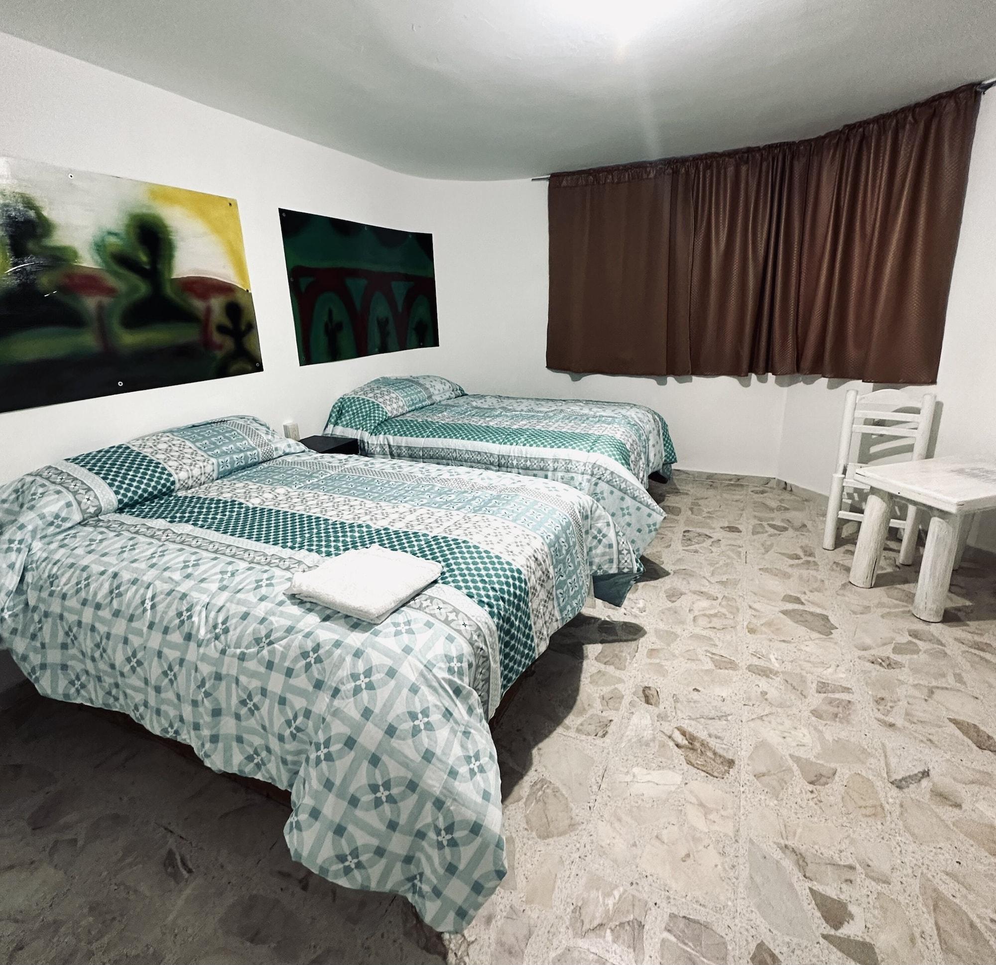 Habitación HOTEL VILLA 12 ORQUIDEAS