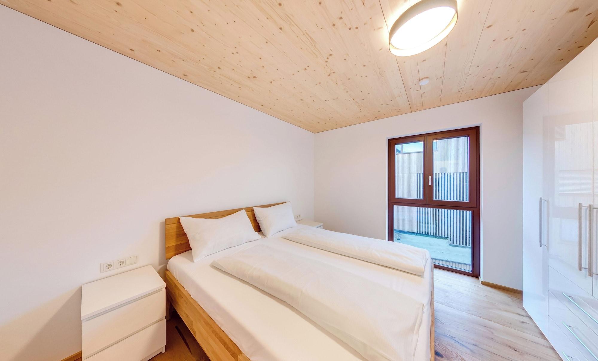 Habitación Urban-Apartmenthaus zwischen Berg und See