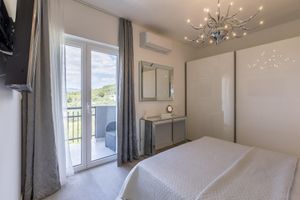 Alquiler Vacacional - Oceanview Escape – Heated Pool, Balcony Sunsets, Grill & Steps to the Beach!