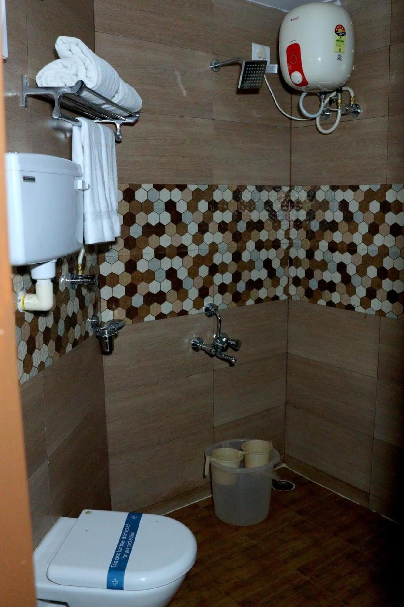 Equipamiento de Habitación Ack Palacce Inn