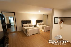 Country Hotel & Suites