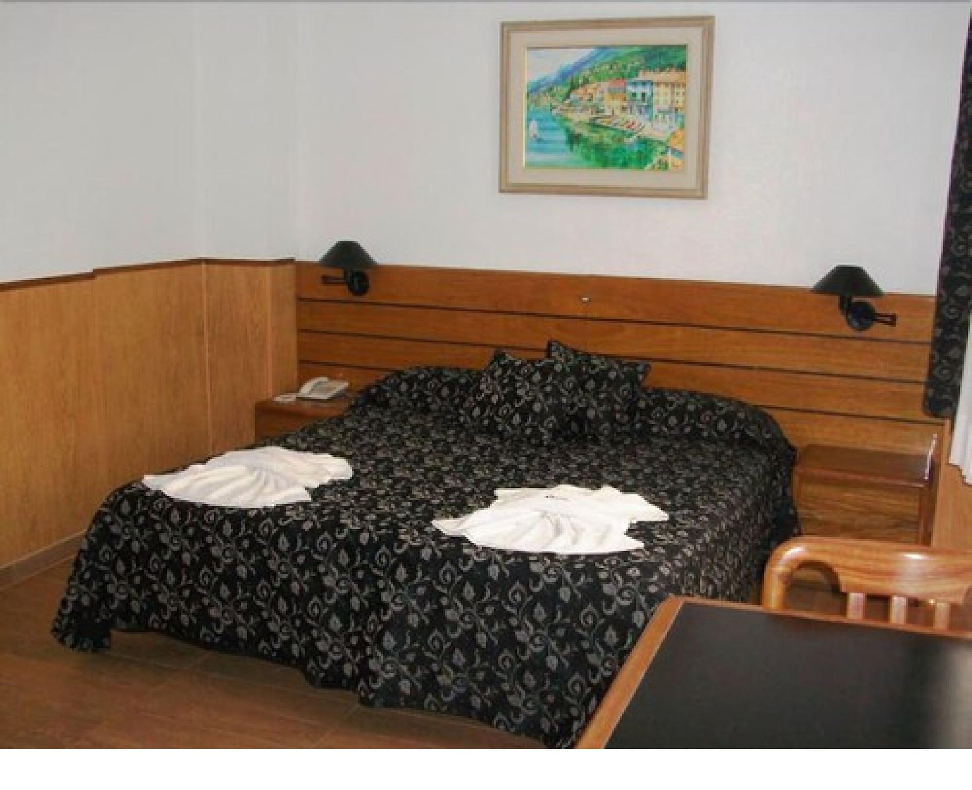 Habitación Village Garden Apart Hotel