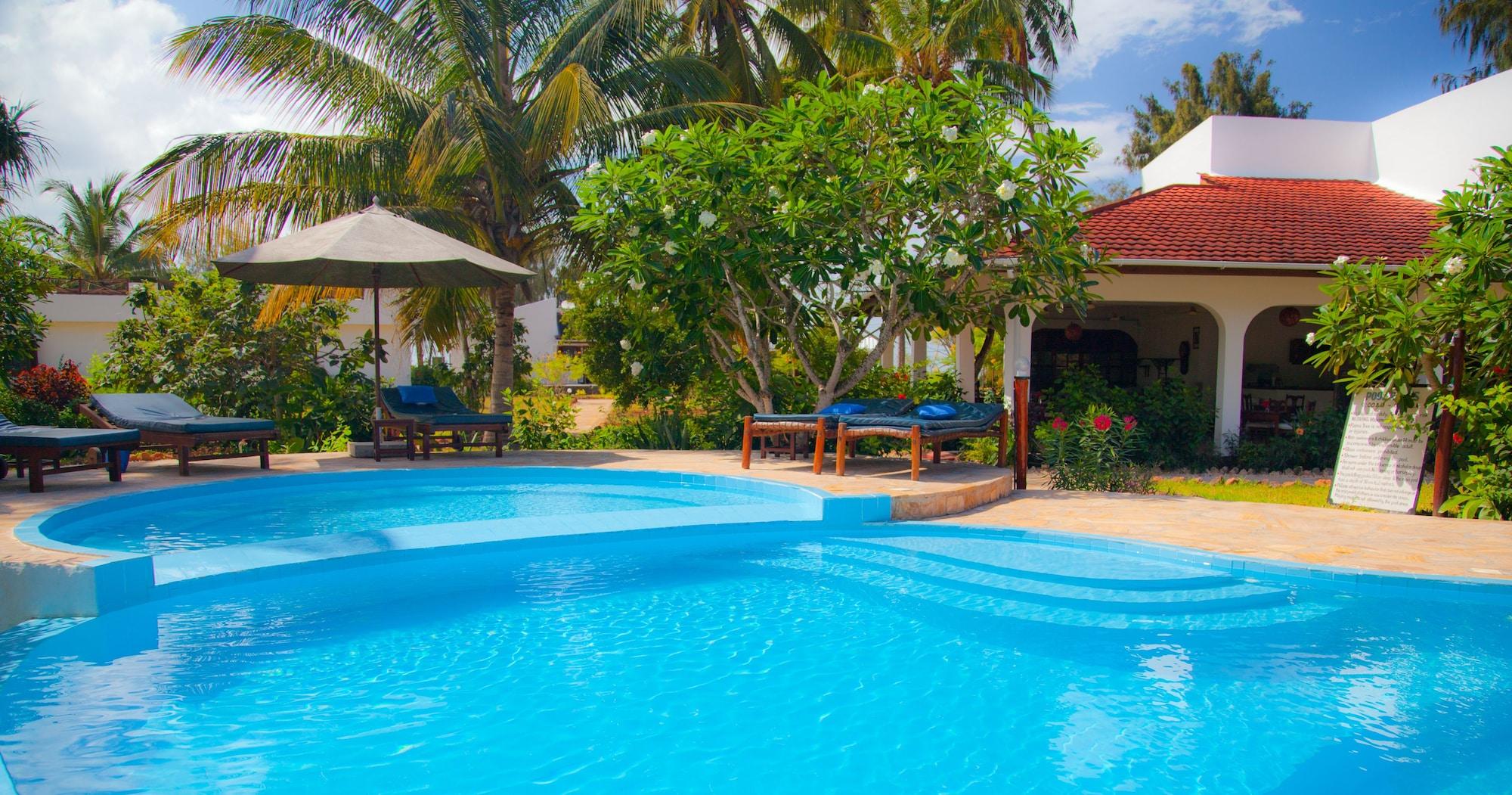 Vista Piscina Flame Tree Cottages