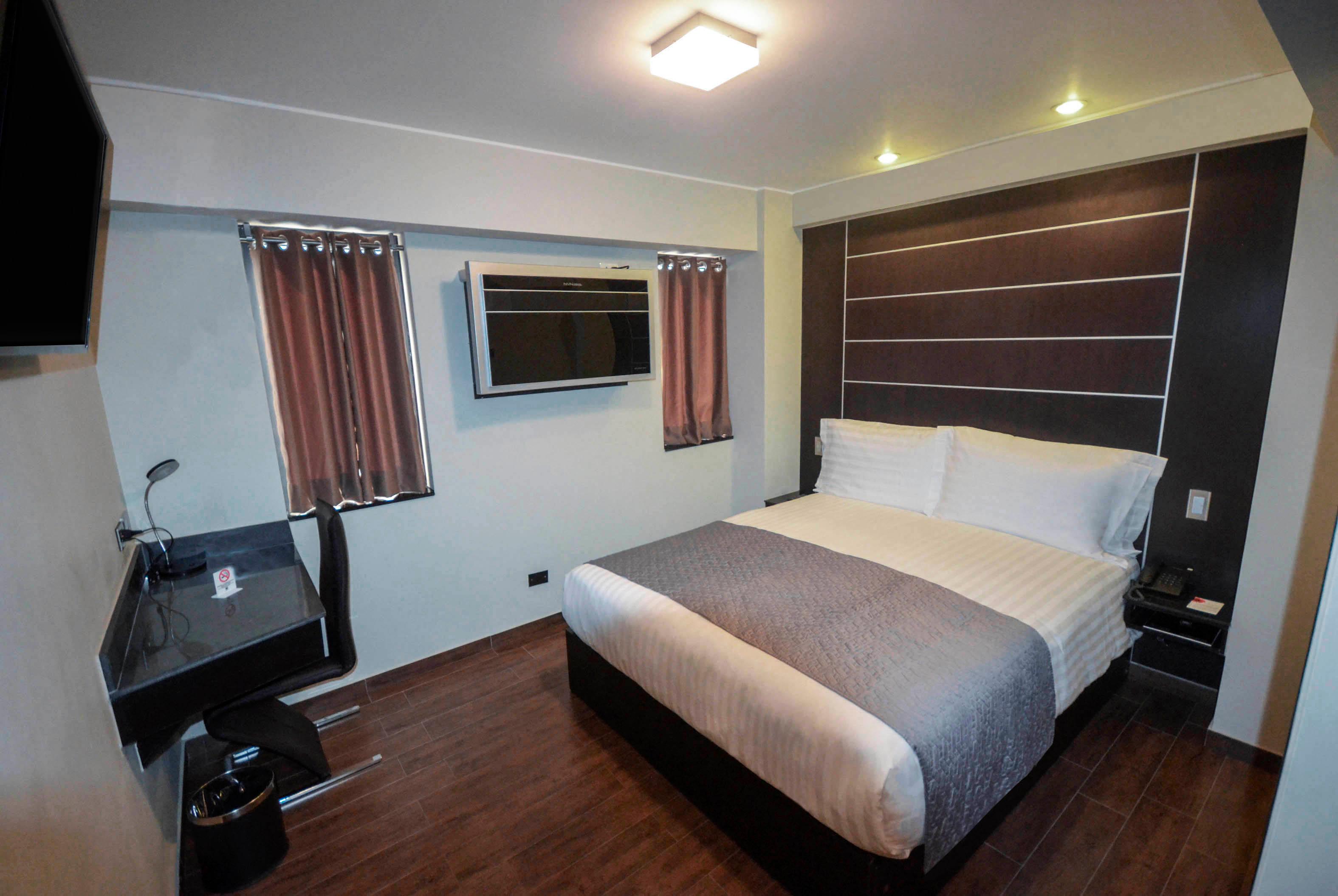 Habitación qp Hotels Trujillo