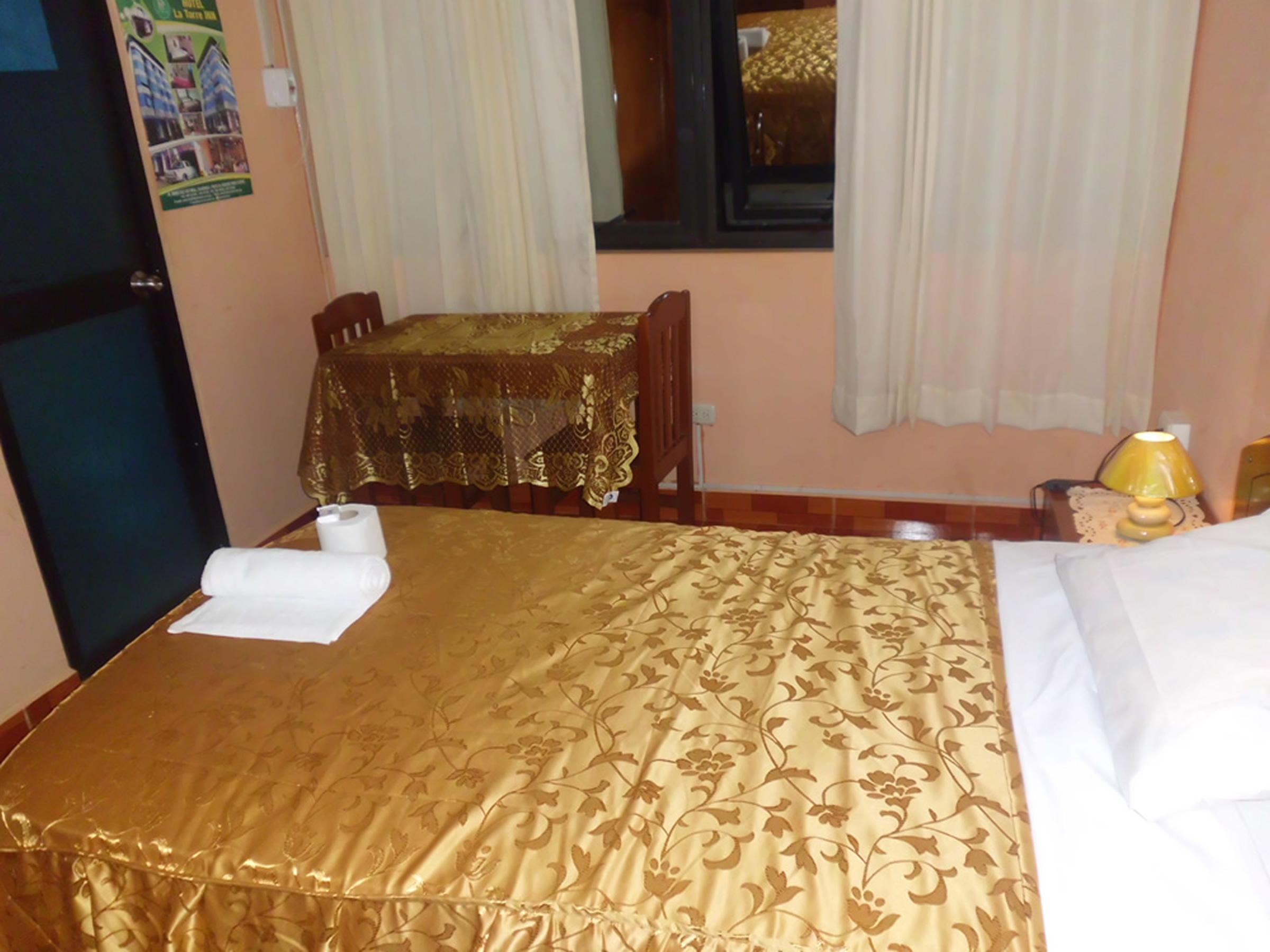 Habitación La Torre Inn