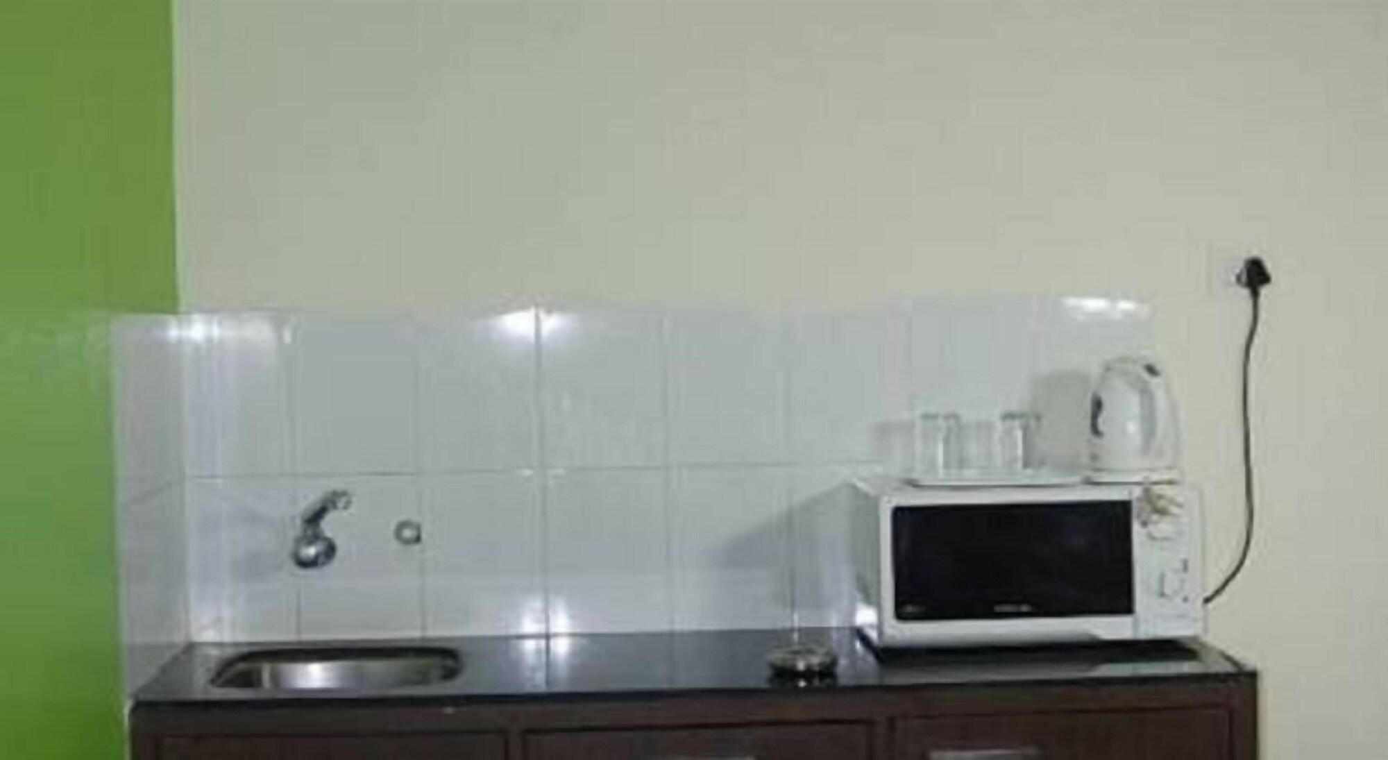 Equipamiento de Habitación Tisha Apartment Hotel