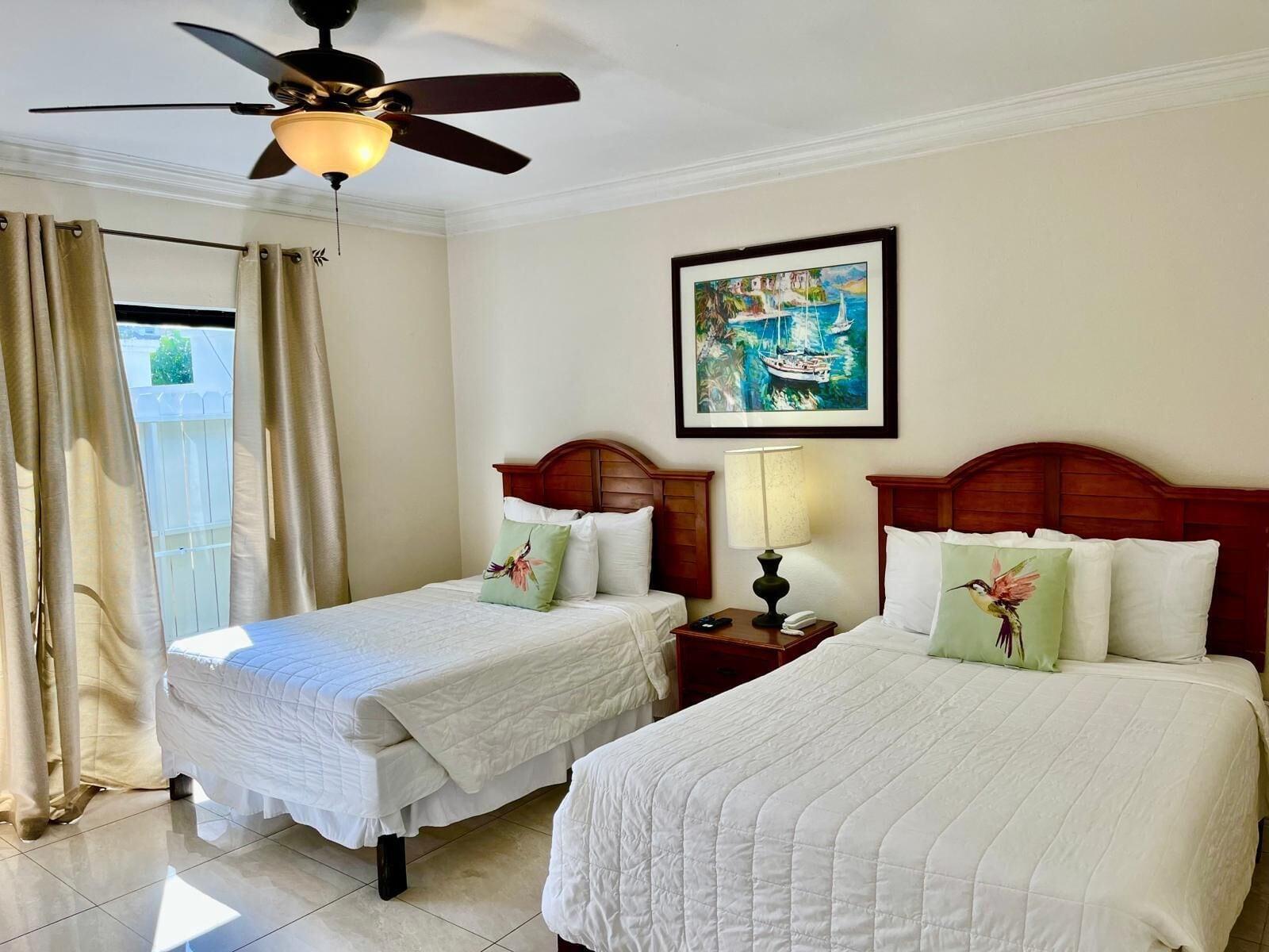 Habitación The Colony Club Inn & Suites