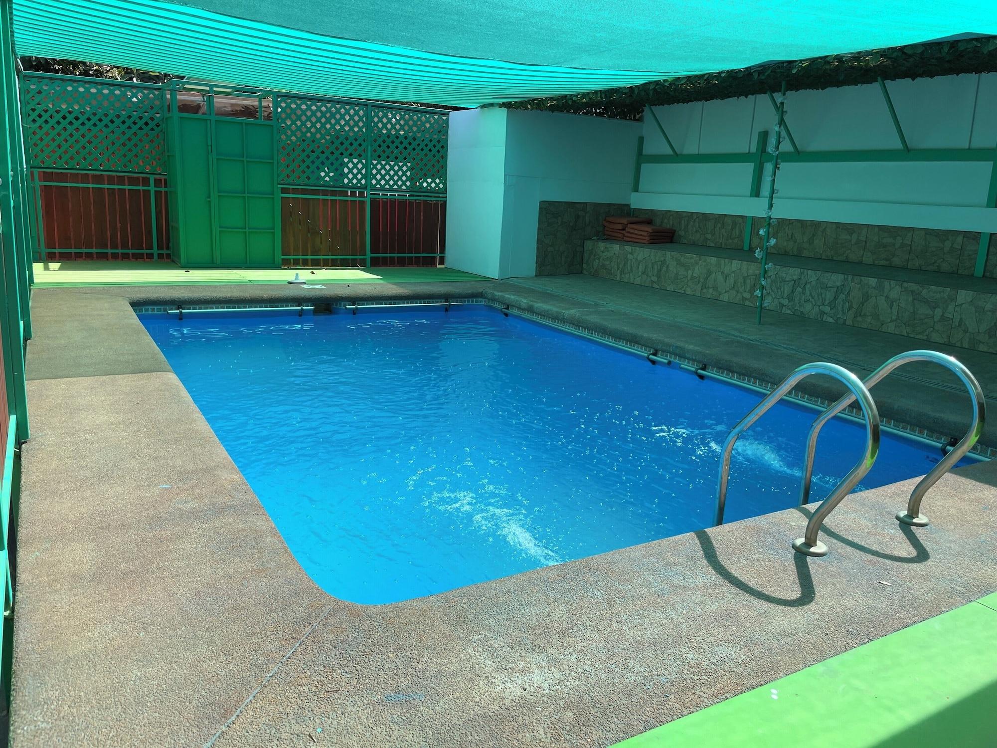 Vista Piscina Hotel Go Go SpA