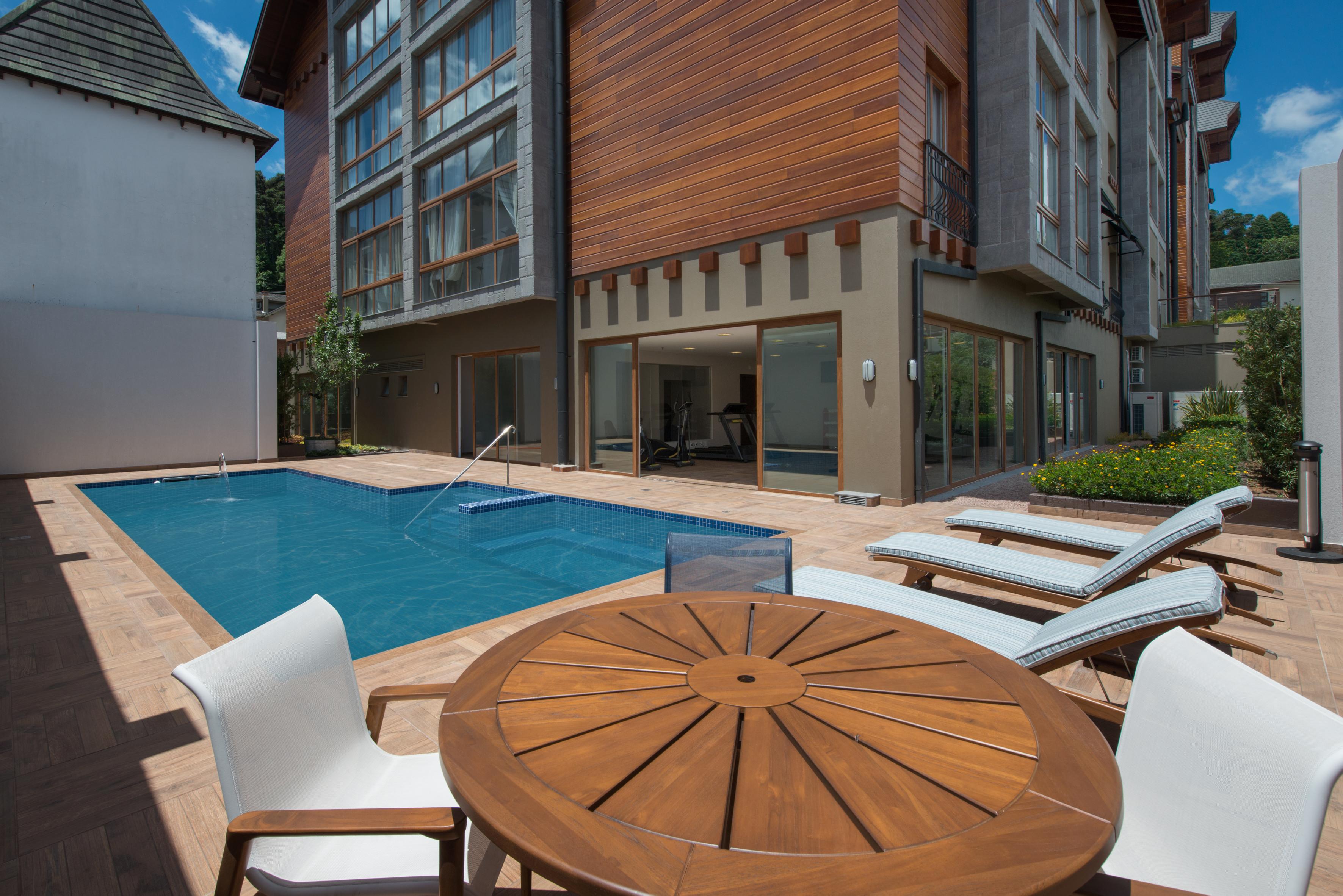 Vista Piscina Prodigy Gramado by Wish