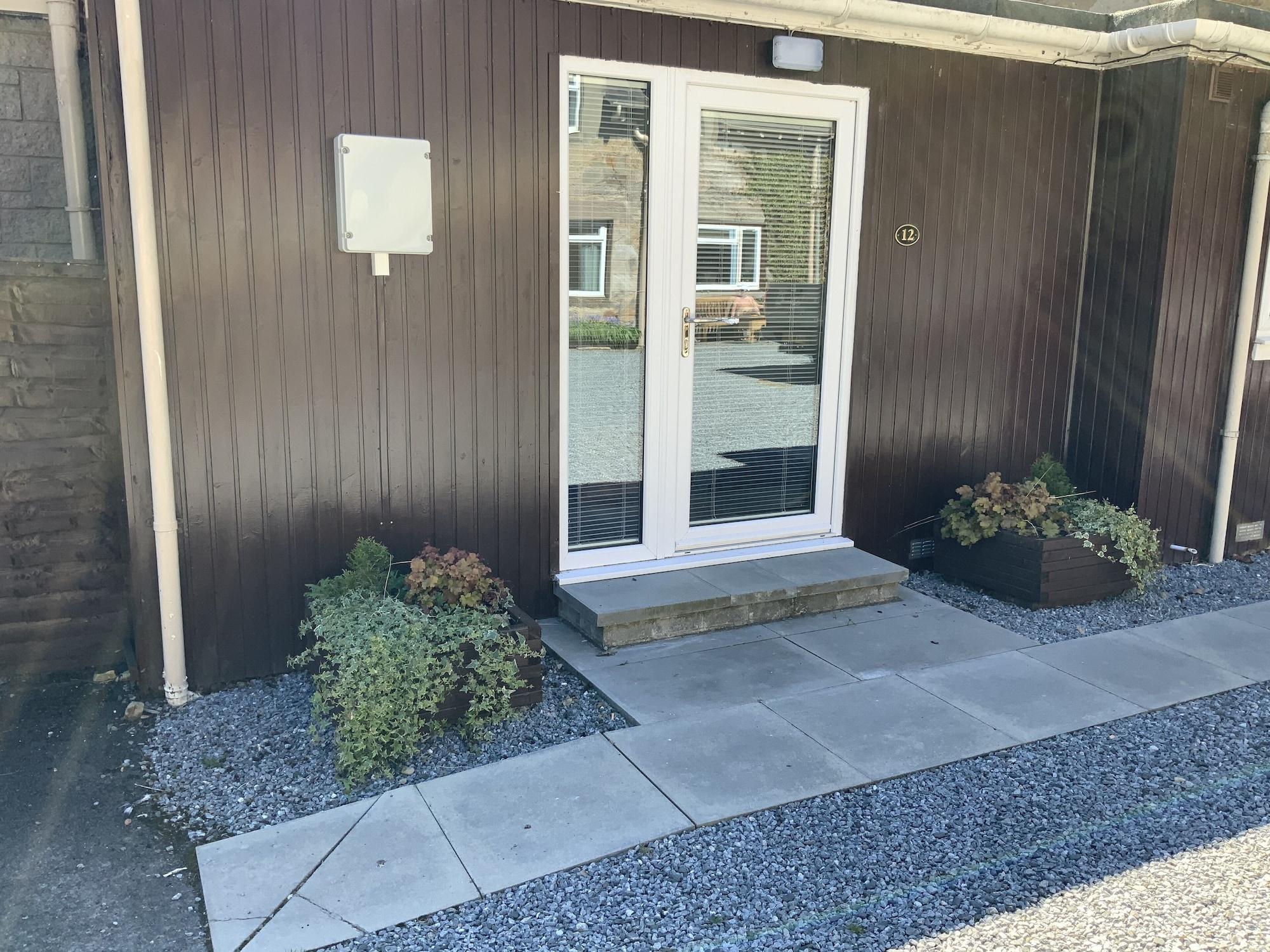 Equipamiento de Habitación Claymore Guest House and Apartments