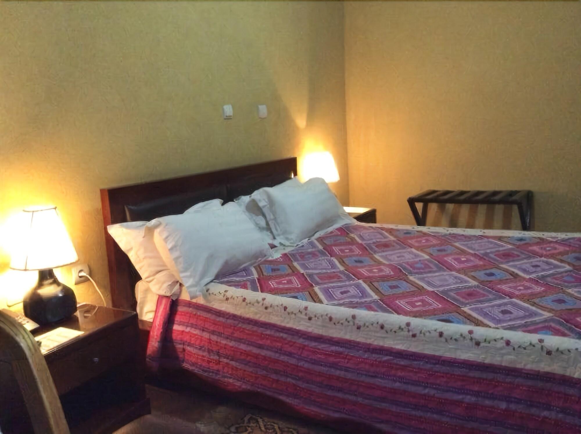 Habitación The Lions Den Hotel