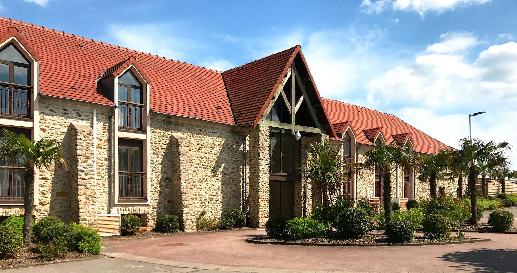 Vista Exterior Hotel Les Suites - De Crécy