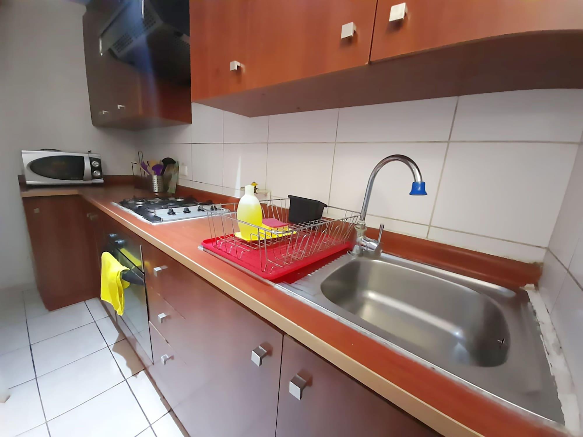 Comodidades do quarto VIP Apartments Chile