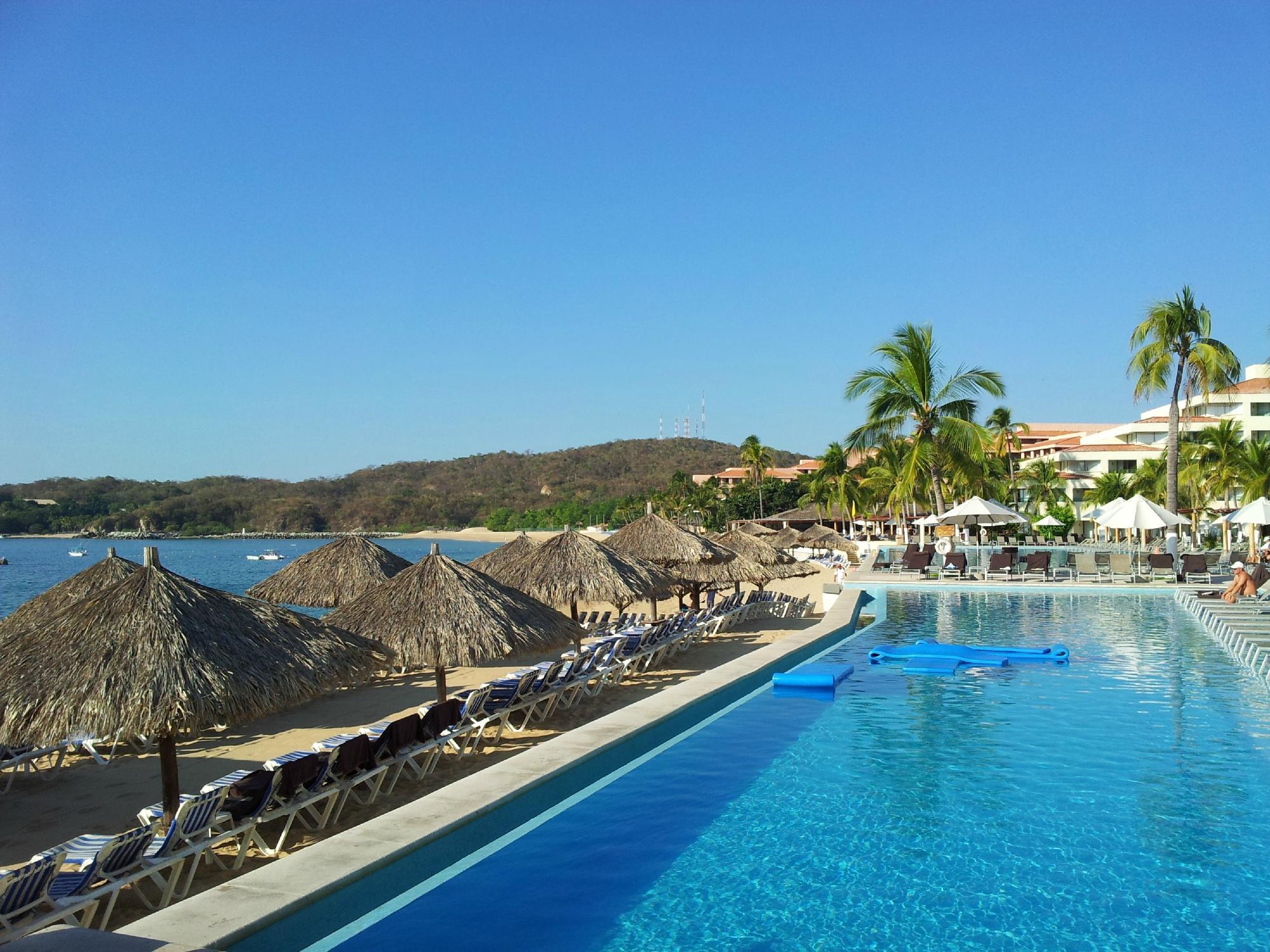 Vista da piscina Dreams Huatulco Resort & Spa