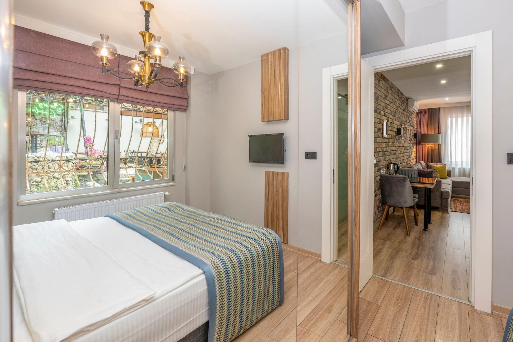 Habitación The Marions Suite Hotel