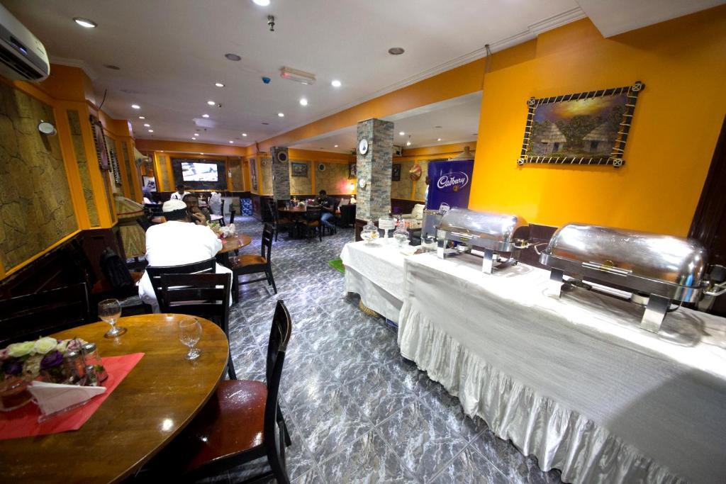 Restaurante New Royal Mark Hotel Apartments