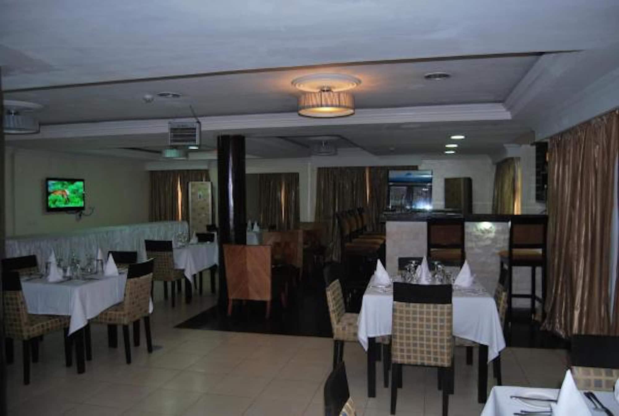 Restaurant Beni Apartment And Suites