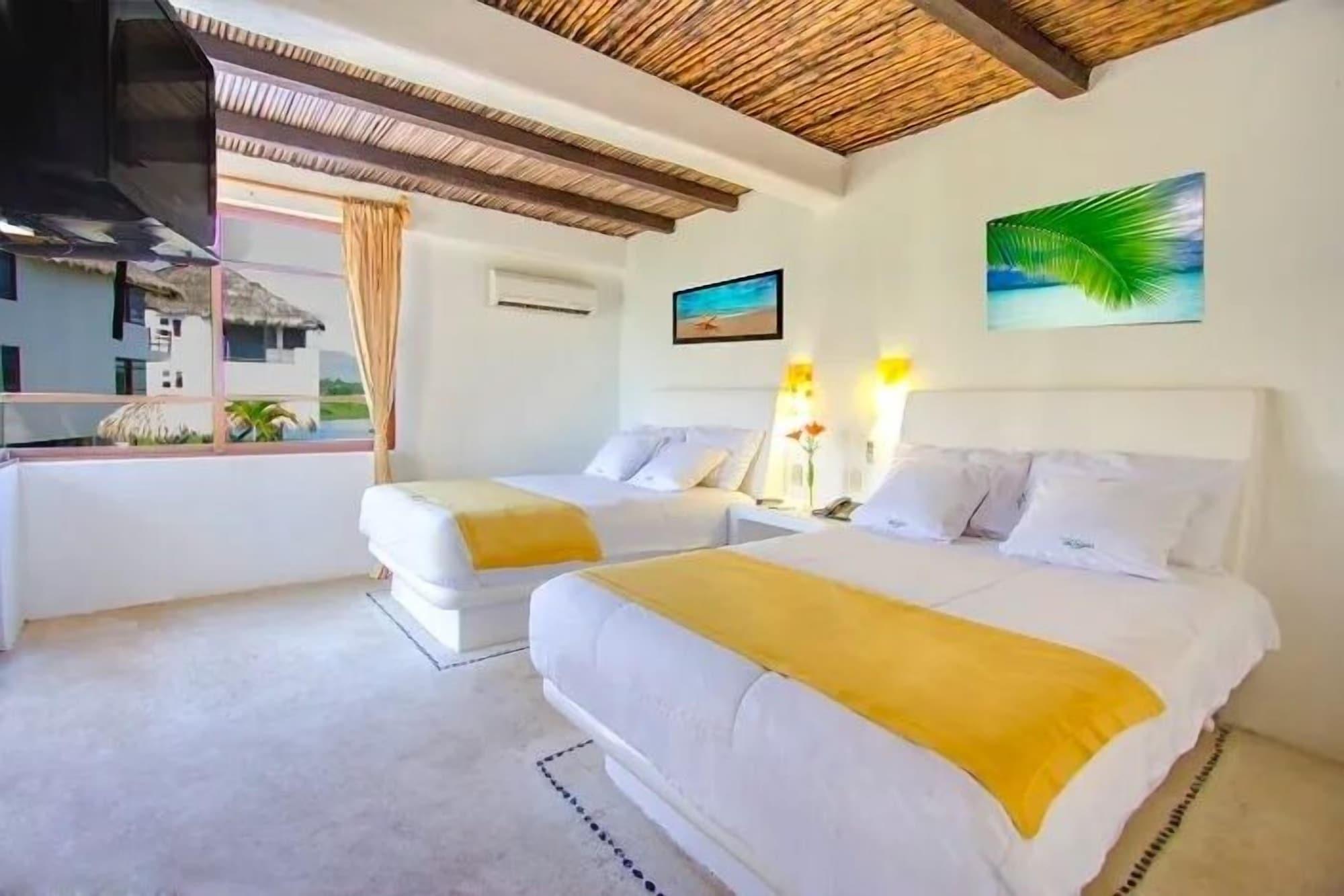 Habitación villas playa azul