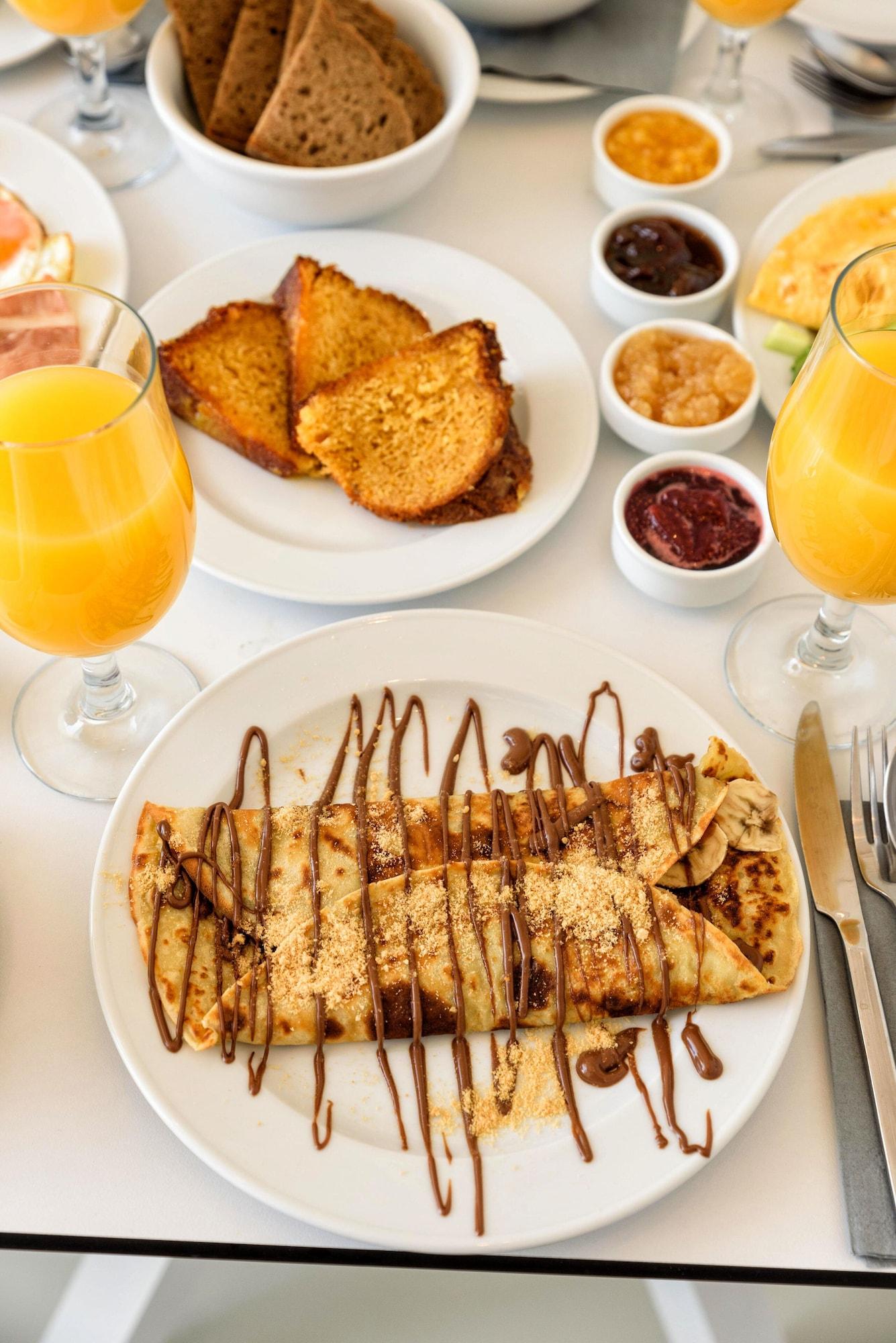 Restaurant Blue Waves Suites & Apartments To Kyma