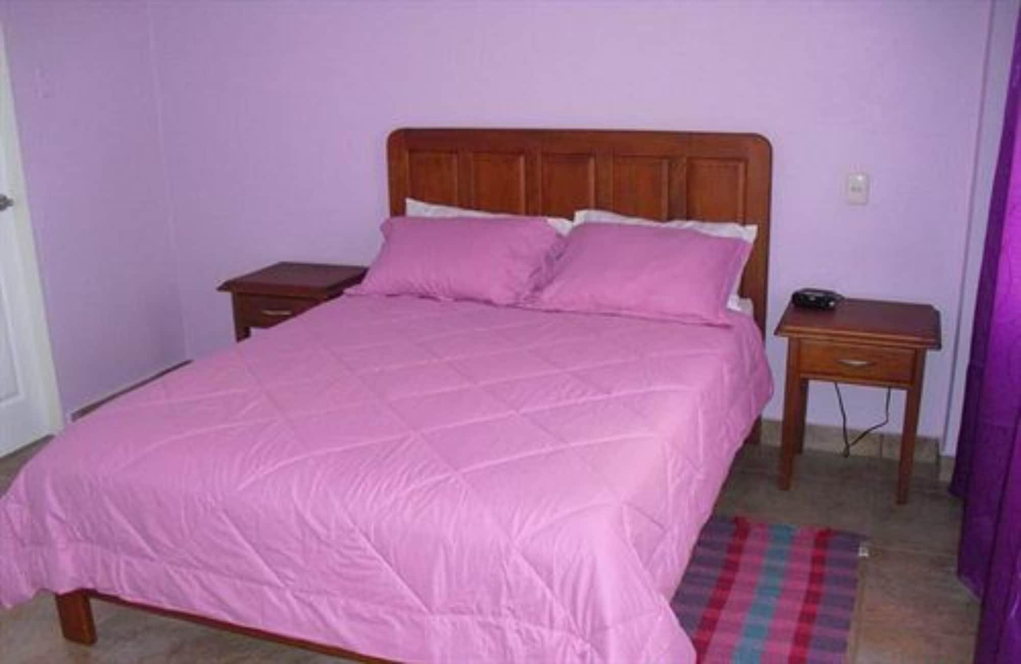 Habitación Piarco Village Suites