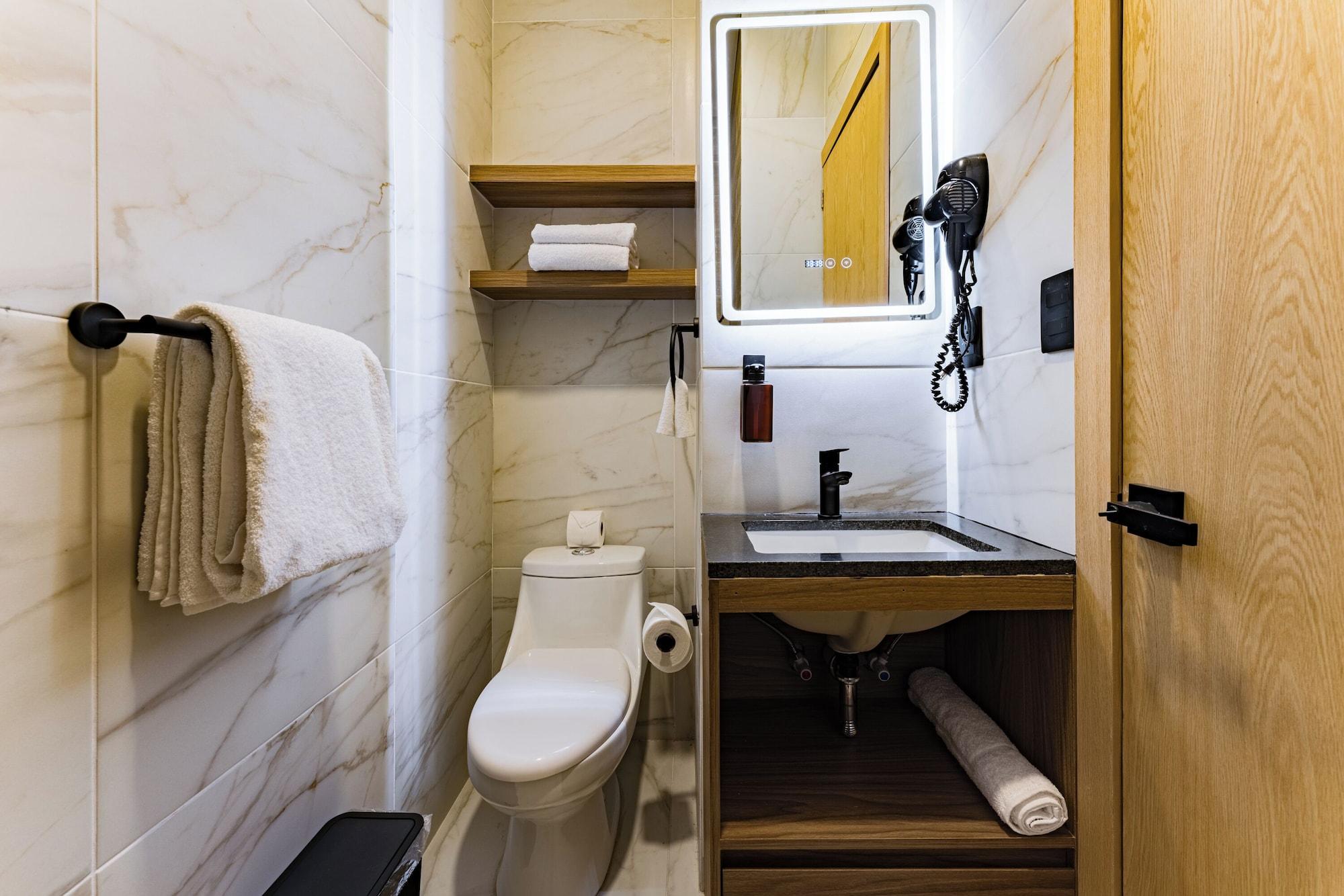 Equipamiento de Habitación Suites Monterrey by Escajal Suites