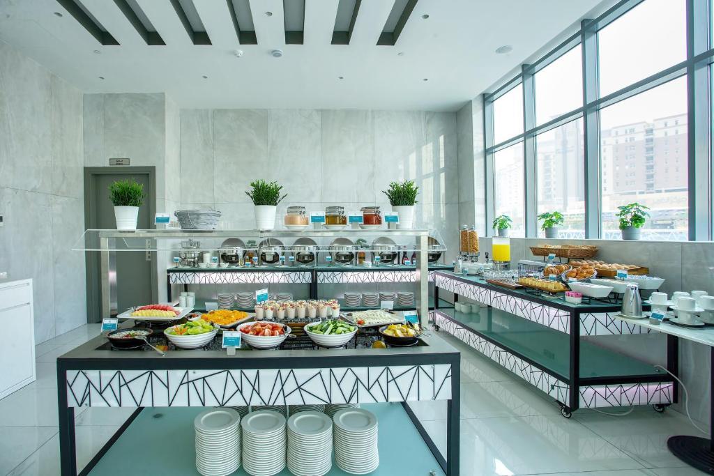 Restaurant City Avenue Al Reqqa Hotel