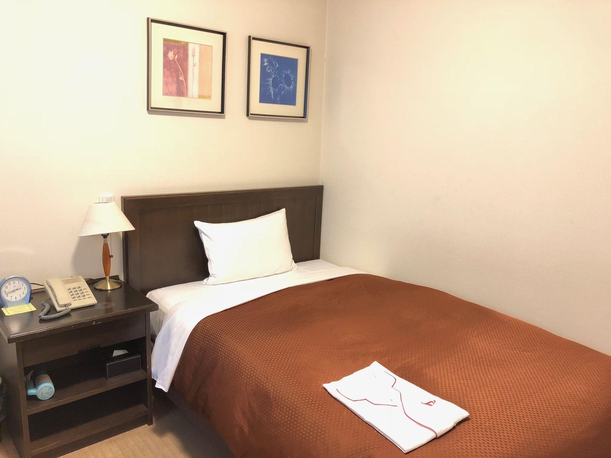 Habitación Laxio-Inn