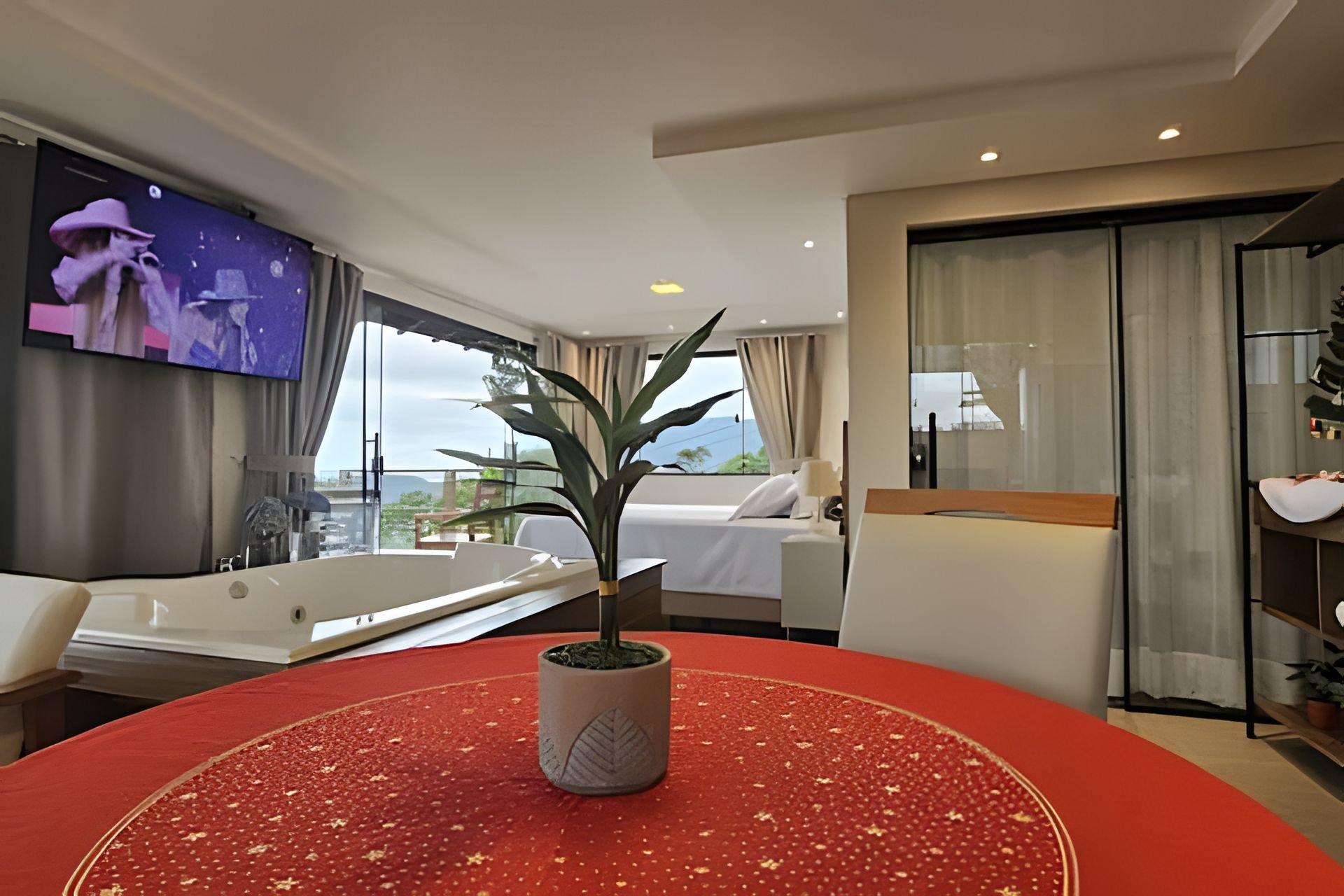 Gimnasio Recanto Pôr do Sol com banheira e lareira